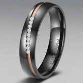 black titanium and rose gold ring