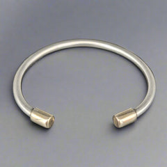 torc braclelet with gold cap end - doyle design dublin