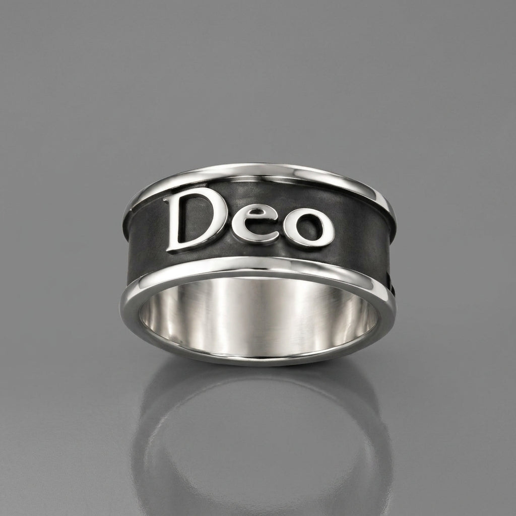 silver and oxidisede ring on a white background
