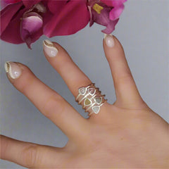 - gemstone stacker rings on the finger =