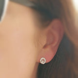 Silver and cz claddagh earring on the lobe  - doyle design dublin#