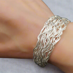 wicker bracelet on the wrist - doyle design dublin