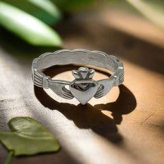 silver claddagh ring with knotted shank