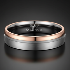 Two-toned ring with rose gold and silver finish on a textured surface