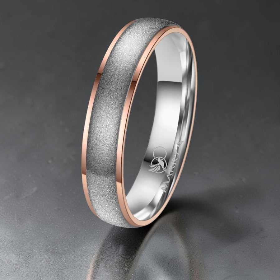 the rise ring titanium and rose gold ring