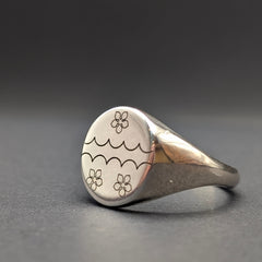 signet ring with family crest