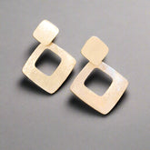 Squared SIlver Earrings on black background - DOyle Design Dublin