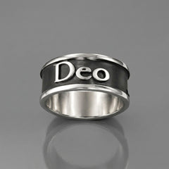 silver and oxidisede ring on a white background