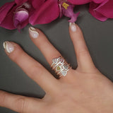 - gemstone stacker rings on the finger =