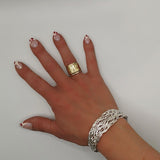 wicker bracelet on the wrist - doyle design dublin