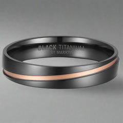 black titanium ring withe rose gold details
