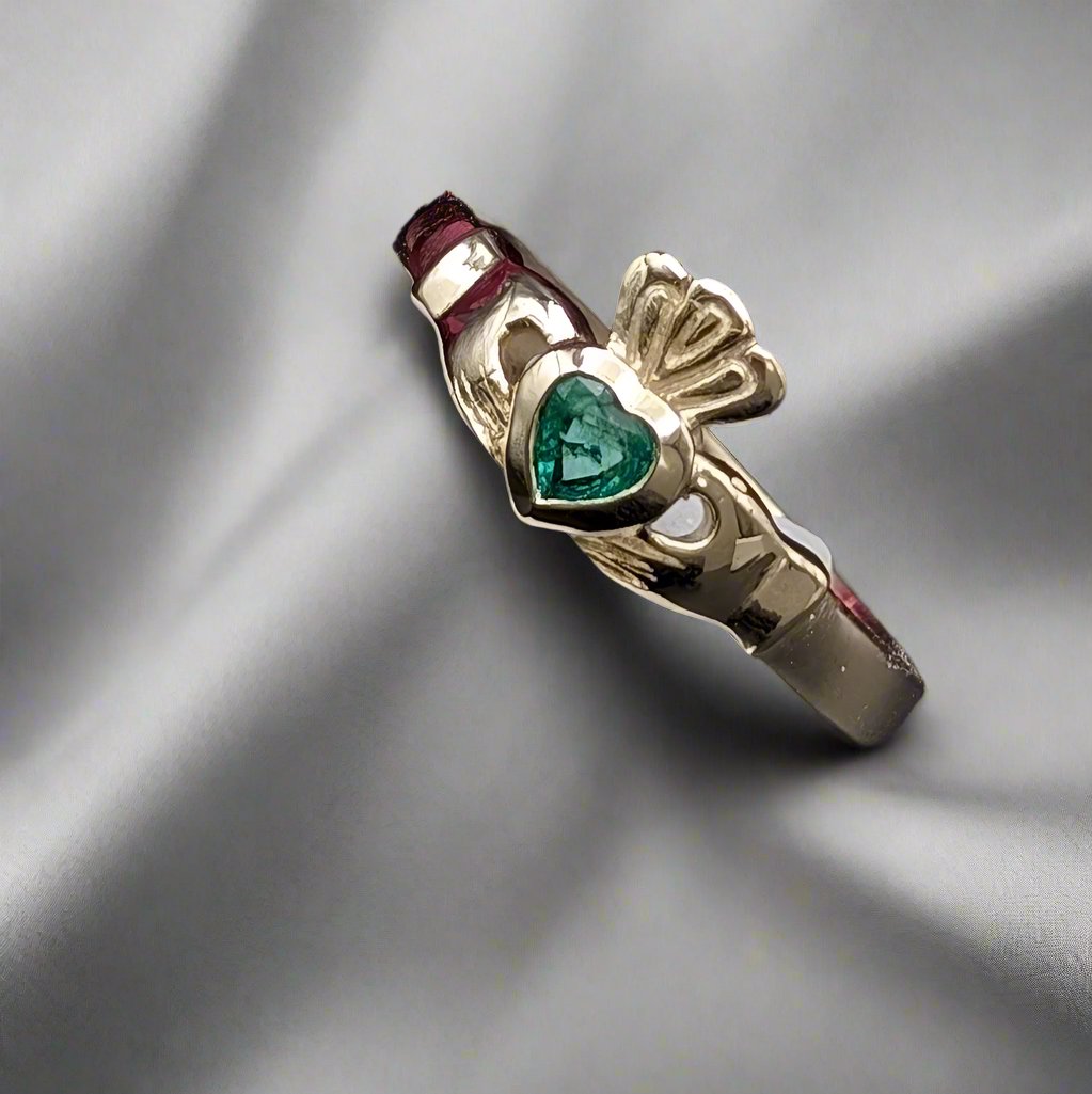 Gold Claddagh ring set with natural emerald - DOyle design dublin