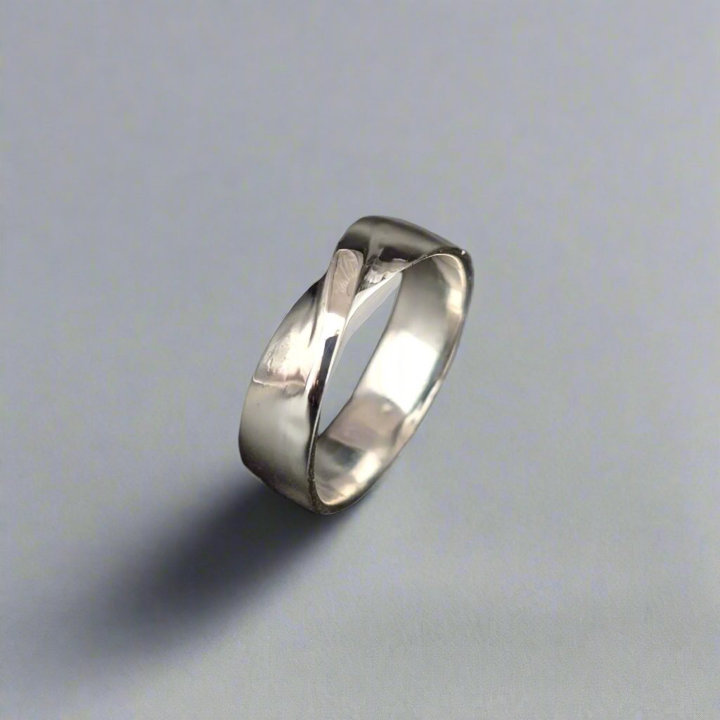 Wedding Ring with Twist centre - doyle design dublin