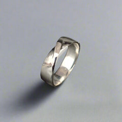 Wedding Ring with Twist centre - doyle design dublin