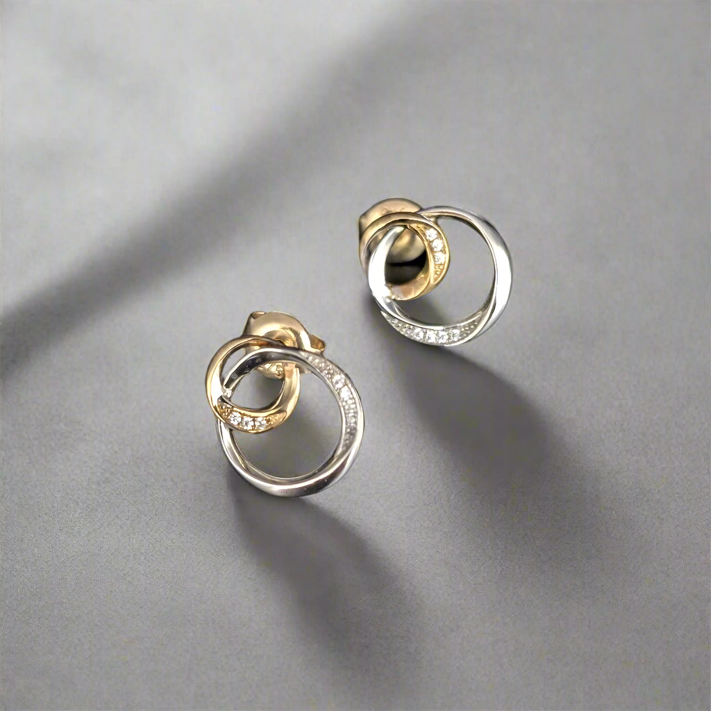 Circled earrings in white and Yellow gold