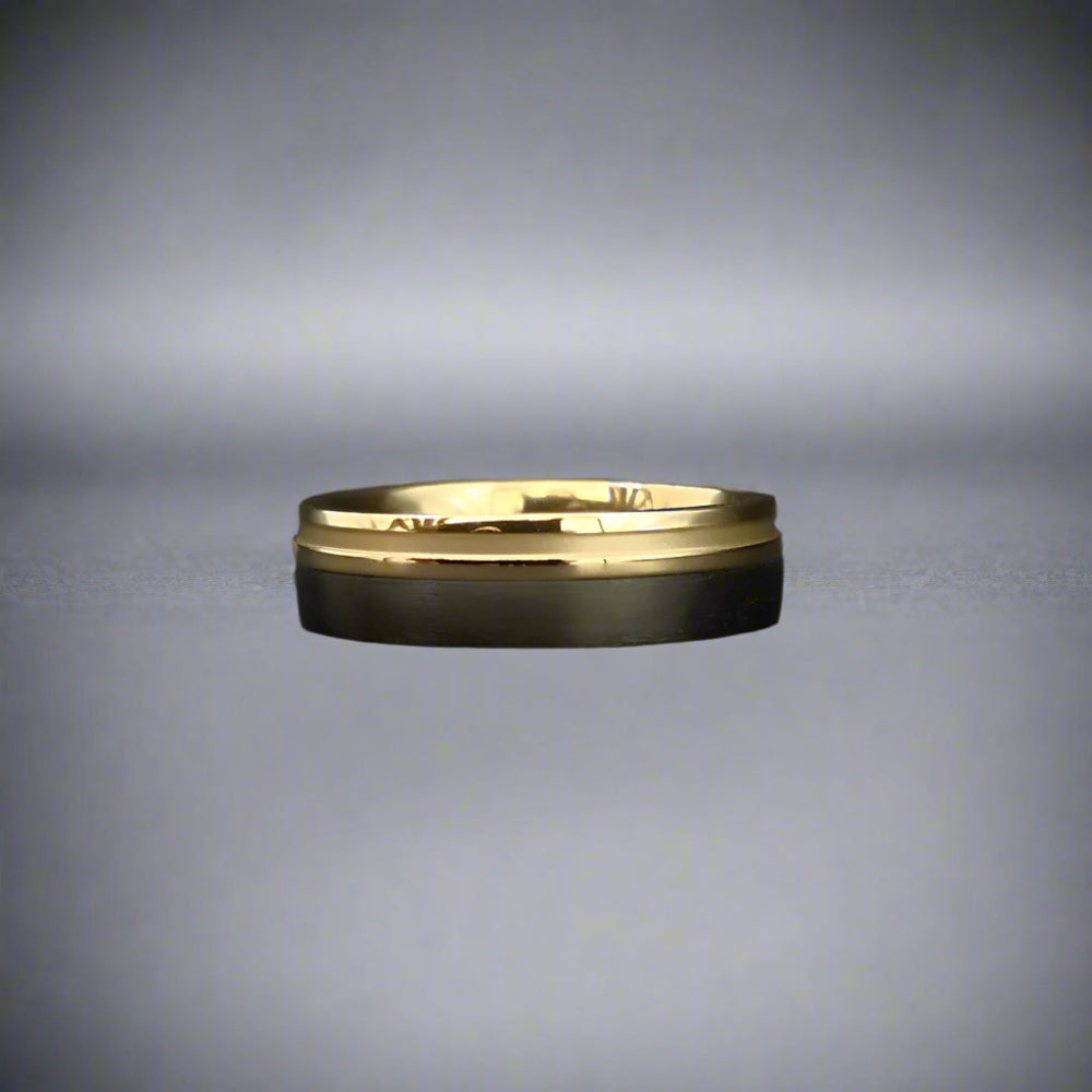 yellow and black wedding ring

