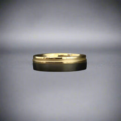 yellow and black wedding ring
