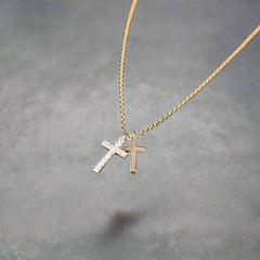 gold double cross in gold 