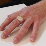 Hammered signet ring on hand - DoyleDesign Dublin